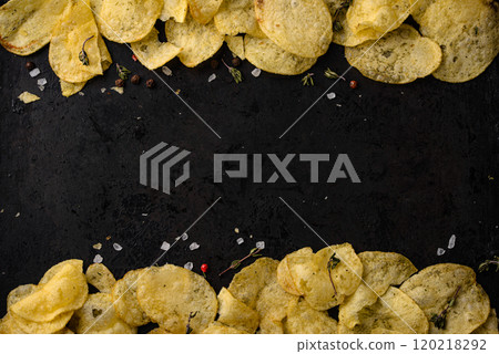 Crispy salty homemade potato chips Crispy salty homemade potato chips 120218292