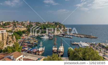 Aerial view of yacht harbor and red house roofs in Old town timelapse Antalya, Turkey. Aerial view of yacht harbor and red house roofs in Old town timelapse Antalya, Turkey. 120218385