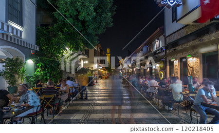 The walk along historic street of Kaleici timelapse hyperlapse with the view on the broken minaret of Kesik Minare Camii mosque in Antalya. 120218405
