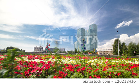 Flowerbed with red and yellow flowers on embankment timelapse hyperlapse. Astana, Kazakhstan Flowerbed with red and yellow flowers on embankment timelapse hyperlapse. Astana, Kazakhstan 120218430