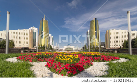 A square in front of Ak Orda with Altyn Orda business center timelapse hyperlapse in the foreground. A square in front of Ak Orda with Altyn Orda business center timelapse hyperlapse in the foreground. 120218433