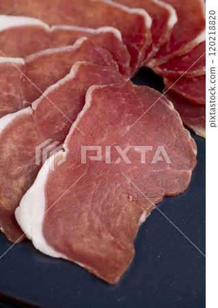 sliced ham with bacon on a board sliced ham with bacon on a board 120218820
