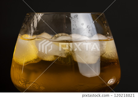 transparent glass with cold apple juice with ice transparent glass with cold apple juice with ice 120218821