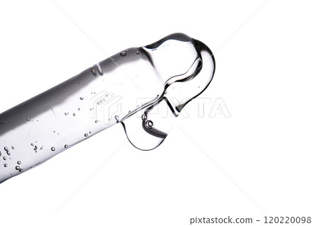 Dropper pipette with delicious serum with bubbles close-up. Dropper pipette with delicious serum with bubbles close-up. 120220098