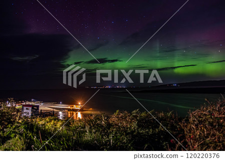 The Aurora Borealis, the northern lights, showing up in Portnoo, County Donegal, Ireland. The Aurora Borealis, the northern lights, showing up in Portnoo, County Donegal, Ireland. 120220376