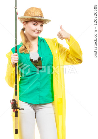 Woman with fishing rod, spinning equipment Woman with fishing rod, spinning equipment 120220509