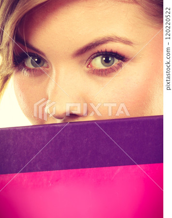 Young teenage student with braid holding books Young teenage student with braid holding books 120220522