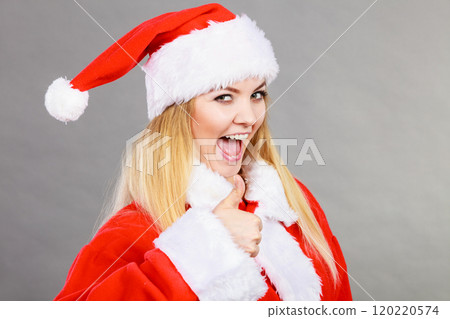 Happy woman wearing Santa Claus helper costume Happy woman wearing Santa Claus helper costume 120220574