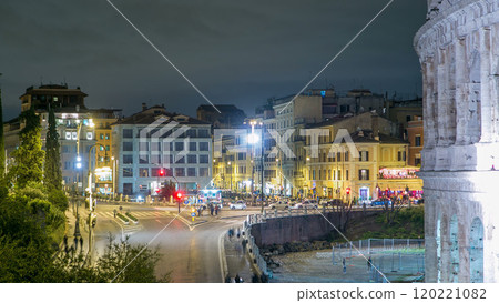 Square near Colosseum illuminated at night timelapse in Rome, Italy Square near Colosseum illuminated at night timelapse in Rome, Italy 120221082