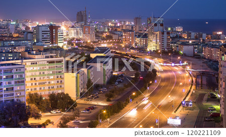 Aktau city after sunset on the shore of the Caspian Sea day to night timelapse. Kazakhstan. Aktau city after sunset on the shore of the Caspian Sea day to night timelapse. Kazakhstan. 120221109