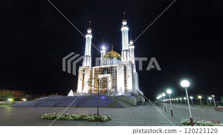 Mosque Nur Gasyr in the city of Aktobe night timelapse hyperlapse. Kazakhstan 120221120