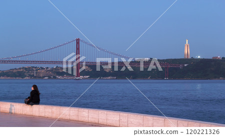 Bridge 25 de Abril on river Tagus at twilight, Lisbon, Portugal timelapse Bridge 25 de Abril on river Tagus at twilight, Lisbon, Portugal timelapse 120221326