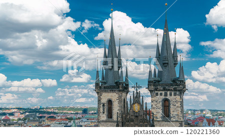 Church of our lady before Tyn timelapse in Prague, Czech republic. Gothic church in Prague Old town with beautiful cloudy sky. Church of our lady before Tyn timelapse in Prague, Czech republic. Gothic church in Prague Old town with beautiful cloudy sky. 120221360