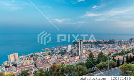 Cityscape of Monte Carlo, Monaco day to night timelapse with roofs of buildings after summer sunset. 120221426