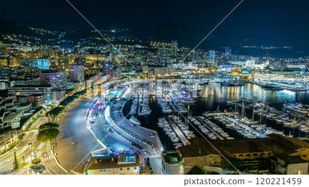 Panorama of Monte Carlo timelapse at night from the observation deck in the village of Monaco with Port Hercules. 120221459
