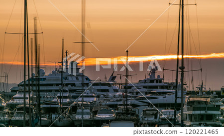 Beautiful sunrise over the harbor in Monaco timelapse. Beautiful sunrise over the harbor in Monaco timelapse. 120221465