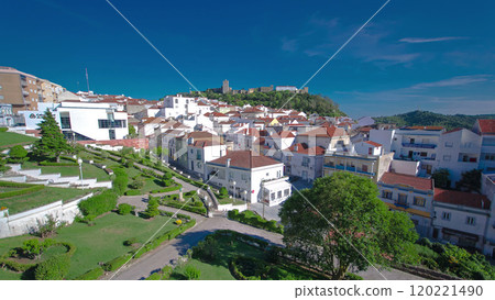 Castle with houses with red roof near the city Sesimbra, Atlantic coast of Portugal timelapse Castle with houses with red roof near the city Sesimbra, Atlantic coast of Portugal timelapse 120221490