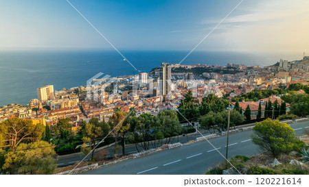 Cityscape timelapse of Monte Carlo, Monaco with roofs of buildings during summer sunset. 120221614