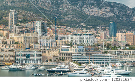 Monte Carlo city aerial panorama timelapse. View of luxury yachts and buildings in harbor of Monaco, Cote d'Azur. 120221624