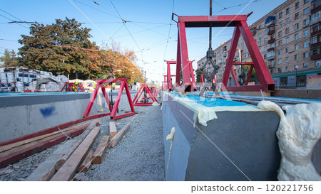 Road construction site with tram tracks repair and maintenance timelapse hyperlapse. Road construction site with tram tracks repair and maintenance timelapse hyperlapse. 120221756