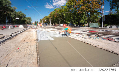 Road construction site with tram tracks repair and maintenance timelapse hyperlapse. Road construction site with tram tracks repair and maintenance timelapse hyperlapse. 120221765