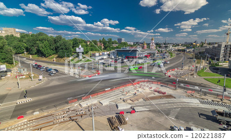 Aerial view of a large city intersection with road construction site urban works timelapse. 120221887