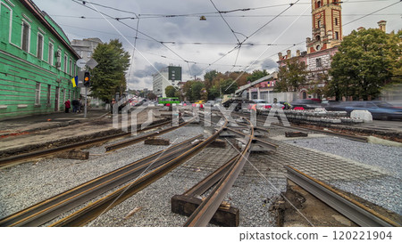 Repair works on the street timelapse. Laying of new tram rails on a city street. 120221904