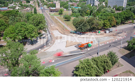 Road construction site with tram tracks repair and maintenance aerial timelapse. Road construction site with tram tracks repair and maintenance aerial timelapse. 120221914