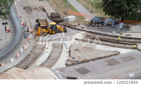Road construction site with tram tracks repair and maintenance aerial timelapse. 120221920