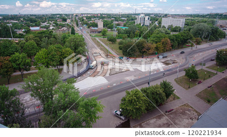 Road construction site with tram tracks repair and maintenance aerial timelapse. 120221934