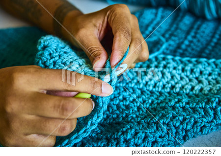 Intricate Crochet Art with African American Hands in Motion Close-Up Intricate Crochet Art with African American Hands in Motion Close-Up 120222357