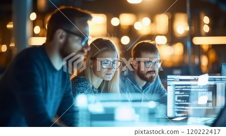 Focused Developers Coding Late Night 120222417