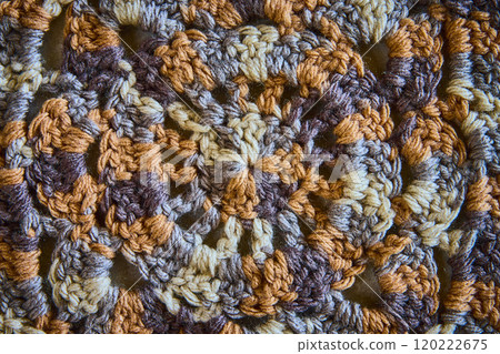 Intricate Crochet Pattern in Earth Tones Texture Close-Up View 120222675