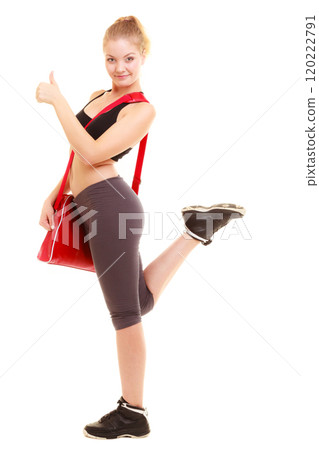 Sport. Fitness sporty girl with gym bag showing thumb up Sport. Fitness sporty girl with gym bag showing thumb up 120222791