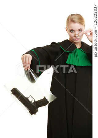 Woman lawyer with gun bag marked evidence for crime. Woman lawyer with gun bag marked evidence for crime. 120222837