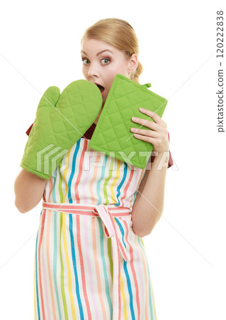 housewife in kitchen apron surprised face wide eyes 120222838