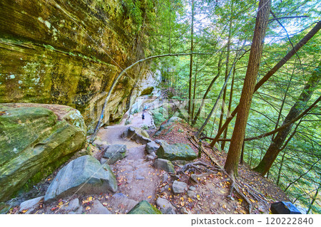 Hocking Hills Forest Trail with Mossy Rock Face and Hiker Perspective Hocking Hills Forest Trail with Mossy Rock Face and Hiker Perspective 120222840