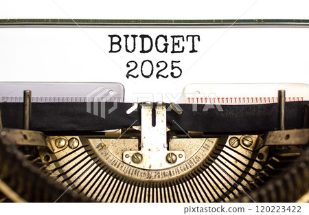 Planning budget 2025 new year symbol. Concept words Budget 2025 typed on beautiful old retro vintage typewriter. Beautiful white paper background. Business budget 2025 new year concept. Copy space. Planning budget 2025 new year symbol. Concept words Budget 2025 typed on beautiful old retro vintage typewriter. Beautiful white paper background. Business budget 2025 new year concept. Copy space. 120223422