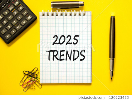 Planning 2025 trends new year symbol. Concept words 2025 Trends on beautiful white note. Beautiful yellow paper background. Black calculator. Business 2025 trends new year concept. Copy space. Planning 2025 trends new year symbol. Concept words 2025 Trends on beautiful white note. Beautiful yellow paper background. Black calculator. Business 2025 trends new year concept. Copy space. 120223423