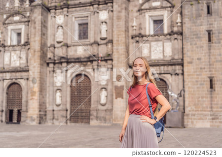 Female tourist in front of Catedral de Puebla, Mexico. Travel, cultural heritage, and historic architecture exploration concept 120224523