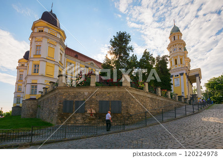 uzhhorod, ukraine - 11 jun 2017: greek catholic cathedral in morning light. historic architecture. pentecost summer holiday. people gathering for celebration. amazing place 120224978