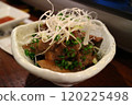 Appetizer topped with shredded green onions 120225498