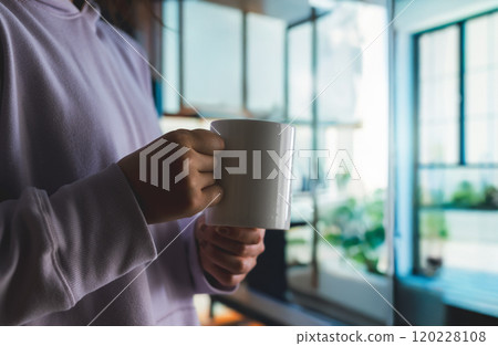 A woman with a mug 120228108