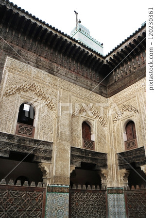 Bou Inania Madrasah with its beautiful exterior wall patterns - Fez, Morocco Bou Inania Madrasah with its beautiful exterior wall patterns - Fez, Morocco 120230361