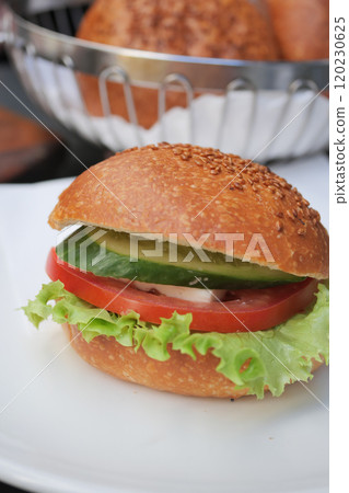 Savor the Delicious Fresh Veggie Sandwich, filled with Crisp Lettuce and Ripe Tomato Savor the Delicious Fresh Veggie Sandwich, filled with Crisp Lettuce and Ripe Tomato 120230625