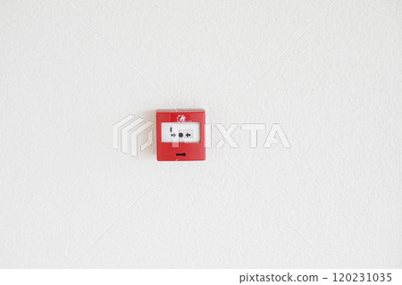 Red fire alarm button on wall , 120231035