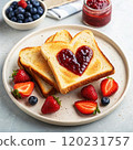 Delicious toast with heart-shaped jam, garnished with fresh berries on a plate. 120231757