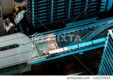 View the automated monorail retuning to its station in Tokyo View the automated monorail retuning to its station in Tokyo 120233658