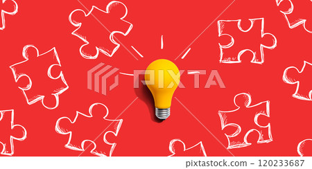 Jigsaw puzzle with a yellow light bulb 120233687