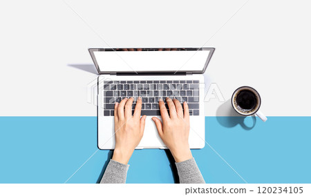 Person using a laptop computer 120234105